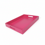 Fuchsia pink tray with a handle on a white background