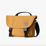 A camel Classic Messenger Bag with black straps and carrying handle , shown against a white background.