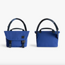 Front and back views of indigo Classic Messenger Bag with black handles and straps, shown on a clean white background.