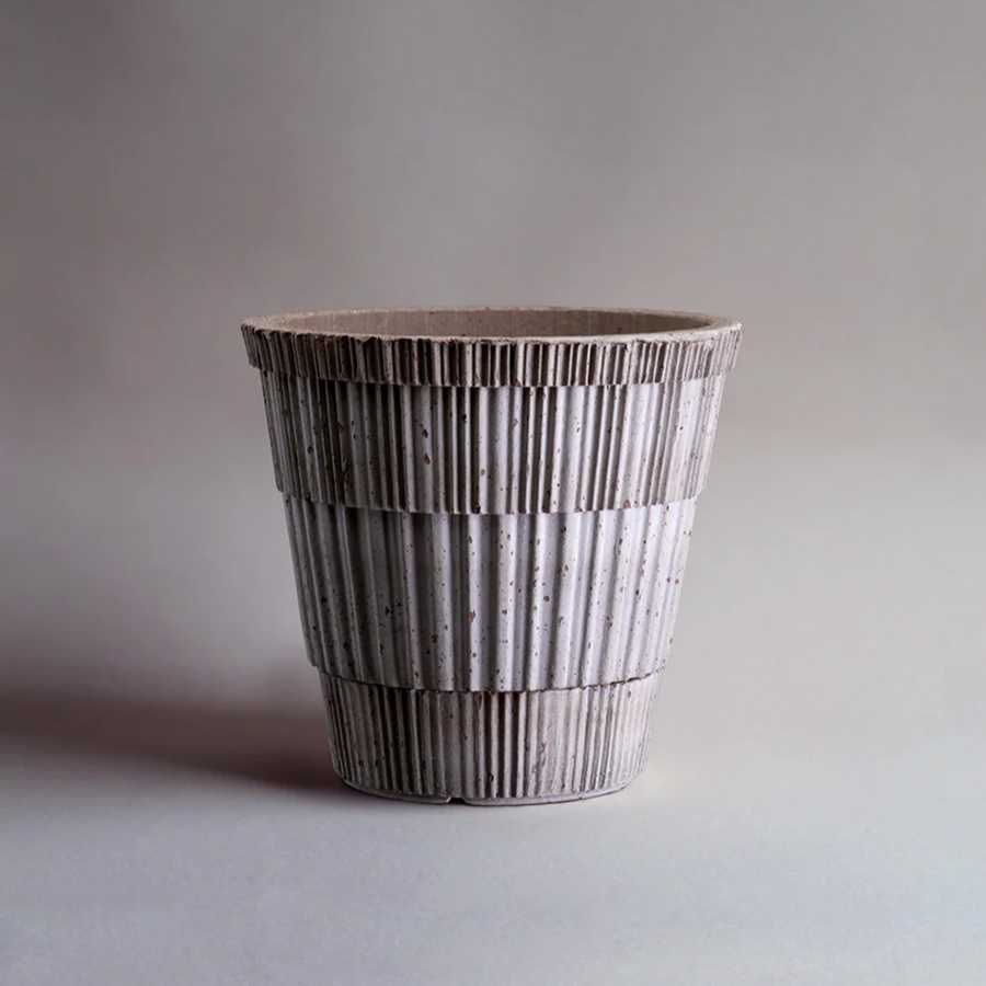 Atlas Plant Pot, handcrafted terracotta pot with textured surface, speckled glaze