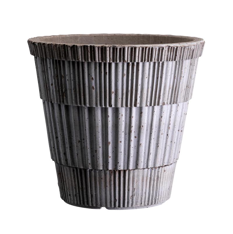 Hand crafted textured terracotta plant pot with speckled gray glaze, white background