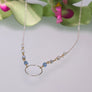 Kylie Necklace with hand-hammered circle, gemstones, wire accents, cable chain