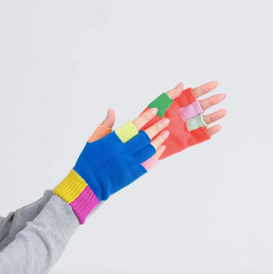 Hand model wearing Mismatch Fingerless Gloves, Rainbow pattern, colorful knit gloves