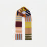 Skinny knit scarf in multiple sections of various desert tone colors and stripes against a white background.