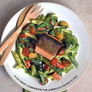Book cover for 'The Complete Guide to Salmon' by James E. Griffin, featuring a close-up photo of a salmon pasta dish on a white plate with wooden utensils, set against a textured gray background.