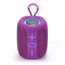 A purple portable Bluetooth speaker with a carrying loop on top, featuring a mesh front grille and illuminated control buttons, shown on a white background.