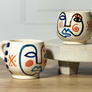 Visage Mug
